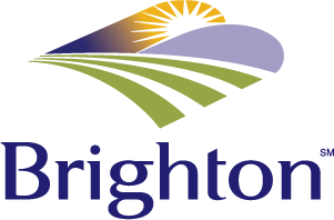 Brighton logo with sun over fields and purple hill design